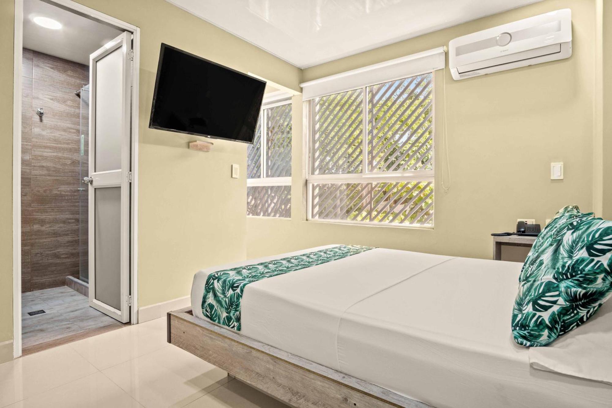 Hotel Eco Suite กาลี ภายนอก รูปภาพ