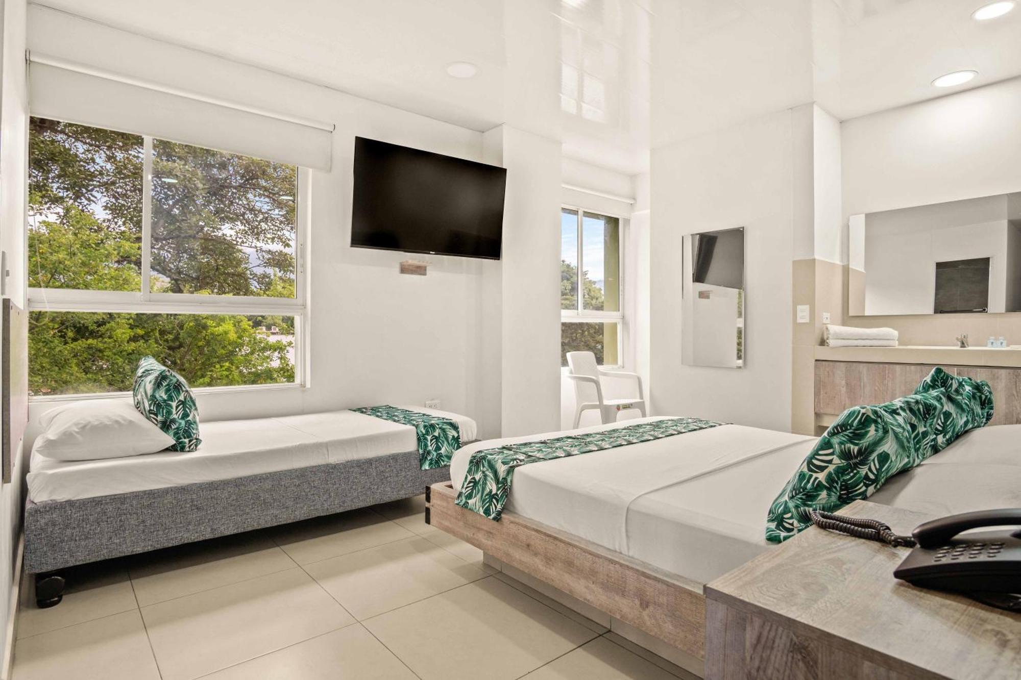 Hotel Eco Suite กาลี ภายนอก รูปภาพ