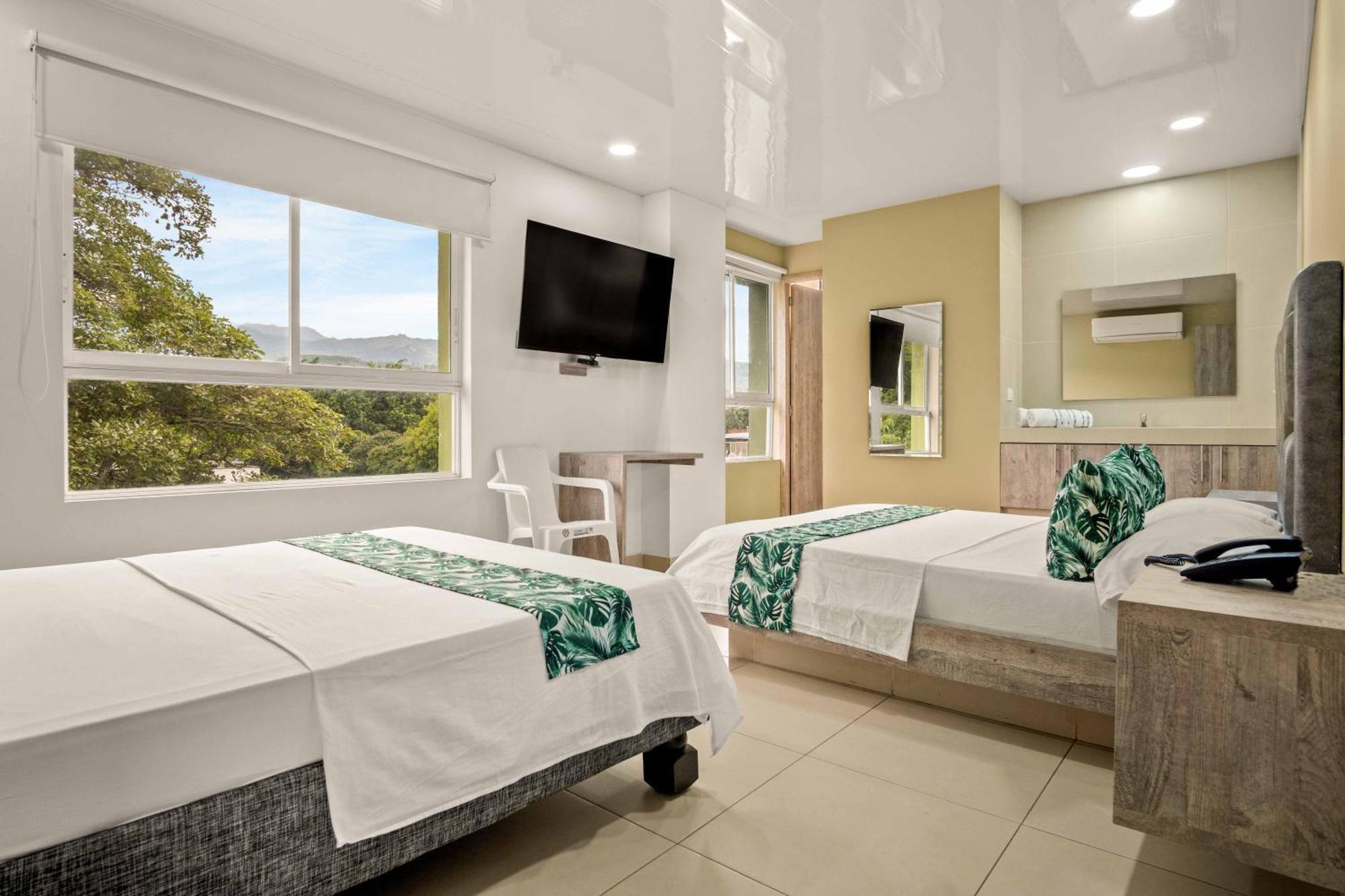 Hotel Eco Suite กาลี ภายนอก รูปภาพ