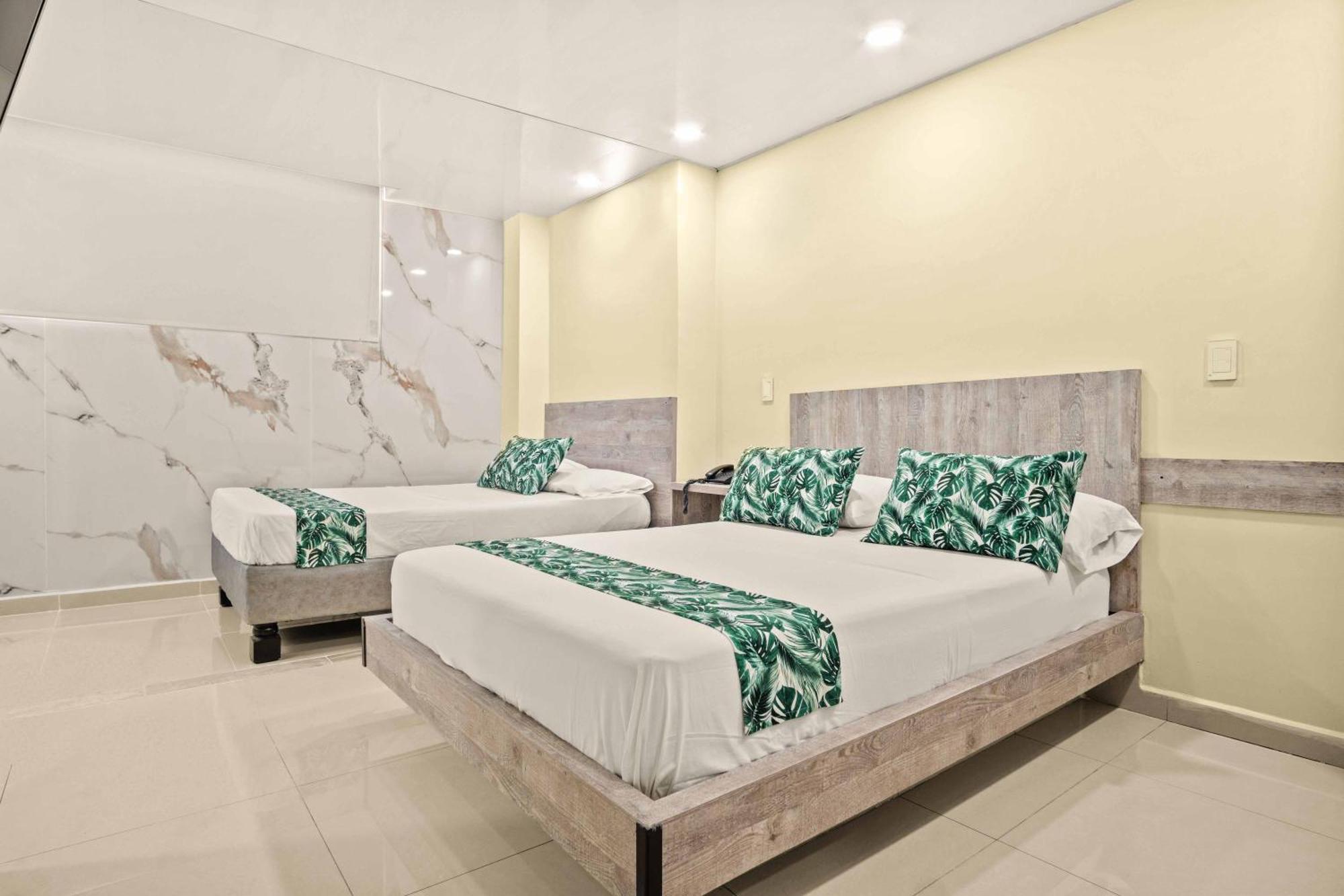 Hotel Eco Suite กาลี ภายนอก รูปภาพ