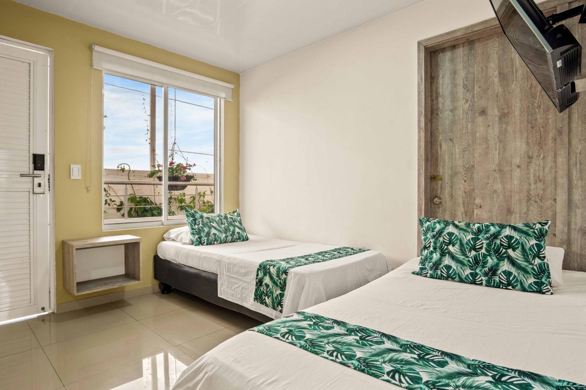Hotel Eco Suite กาลี ภายนอก รูปภาพ