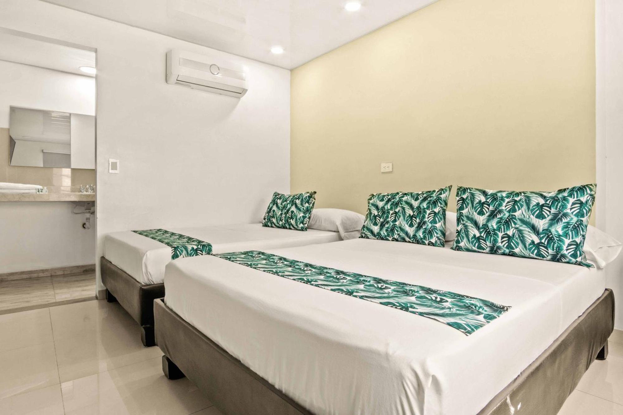 Hotel Eco Suite กาลี ภายนอก รูปภาพ