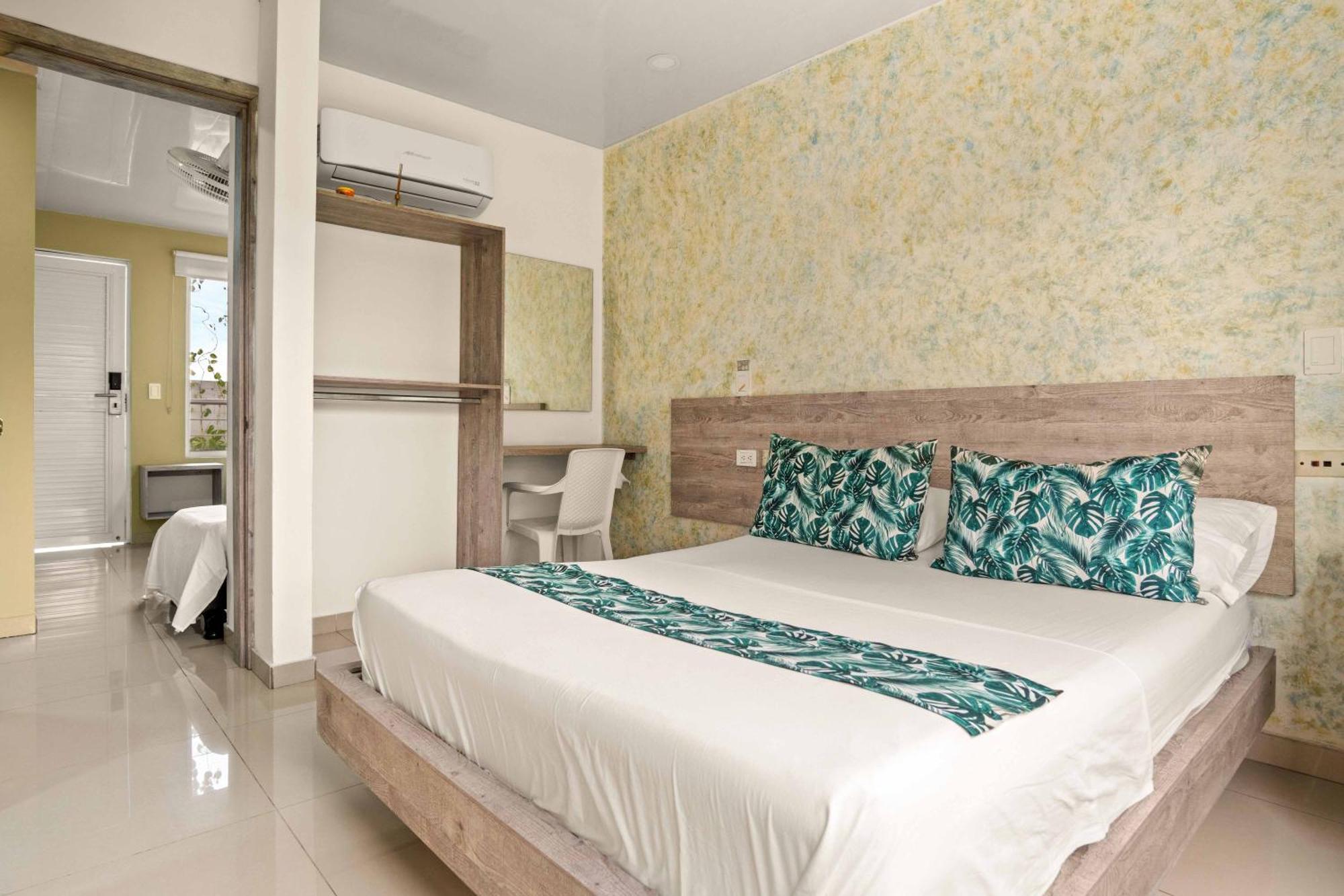 Hotel Eco Suite กาลี ภายนอก รูปภาพ