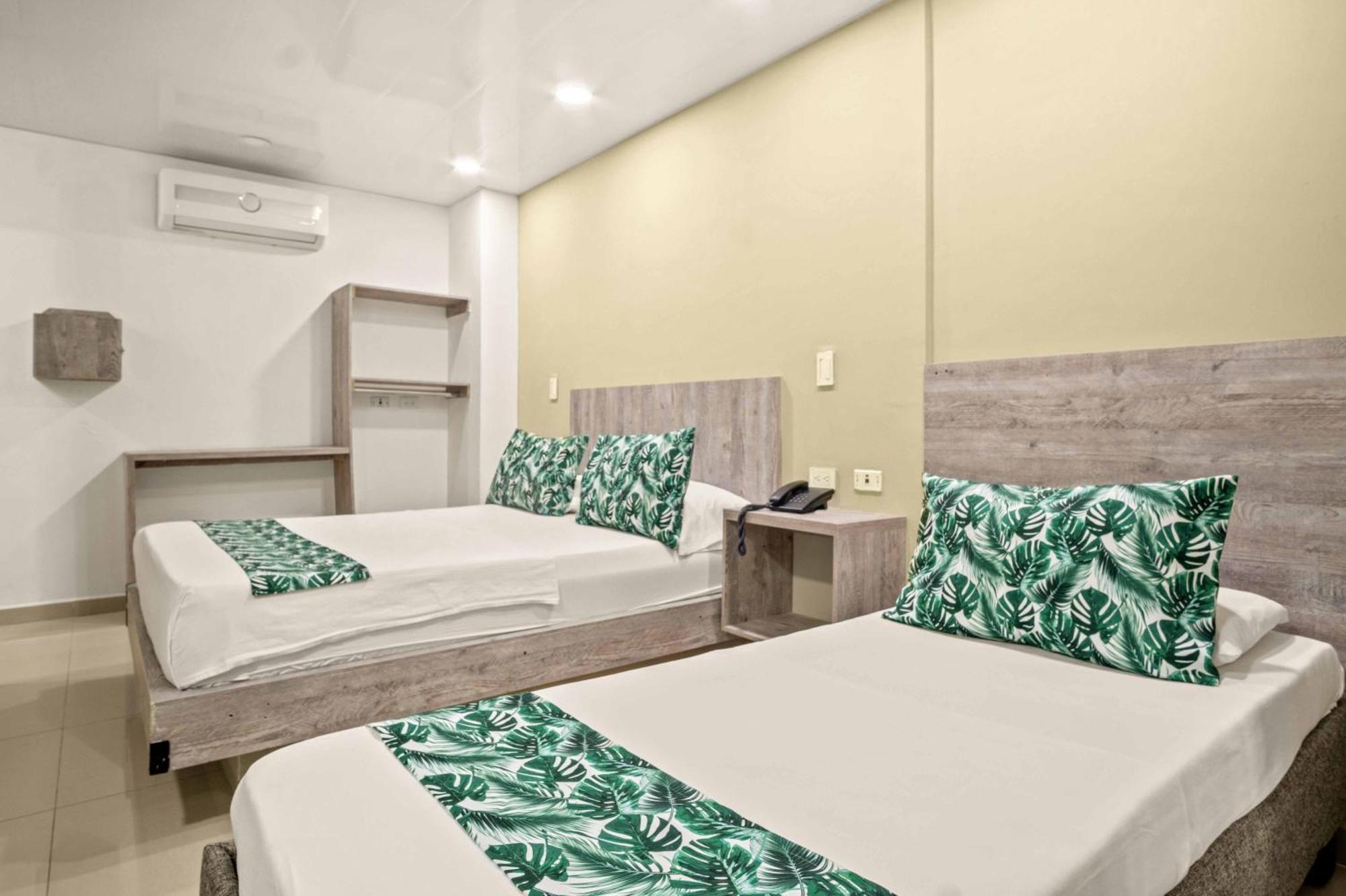 Hotel Eco Suite กาลี ภายนอก รูปภาพ